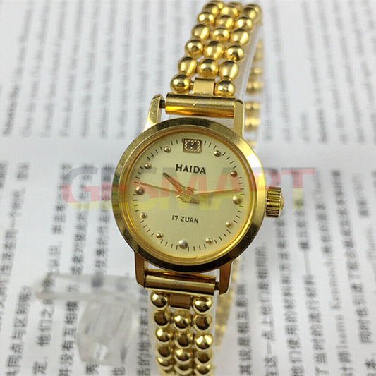 Shanghai brand lady manual mechanical watch with 17 jewels and golden nail design, 22mm case size.