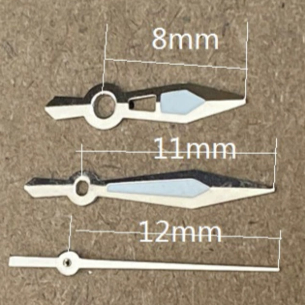 Silver trim green lume arrow watch hands compatible with Ronda 515 quartz, enhancing readability and style.