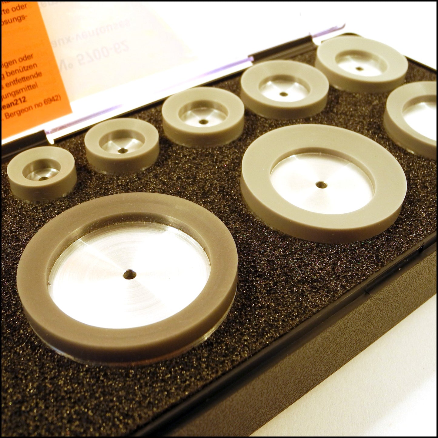 Bergeon 5700-62 suction dies set with 9 round heads and durable Adiprene tips for precise watch repair.