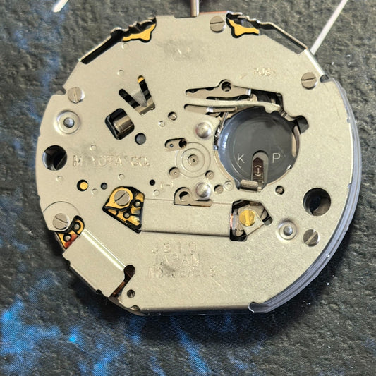 Japan Made Miyota JS10 quartz watch movement displaying small seconds at 6/9/12, precise watch accessory.