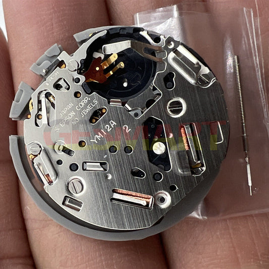 Hattori Epson TMI YM12A quartz watch movement, precision Japan-made mechanism for accurate timekeeping.