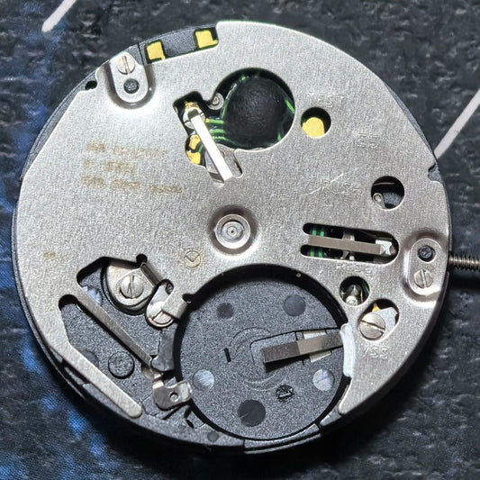 Swiss Made ISA 2330 quartz watch movement with black font date at 6, ideal for precise repairs
