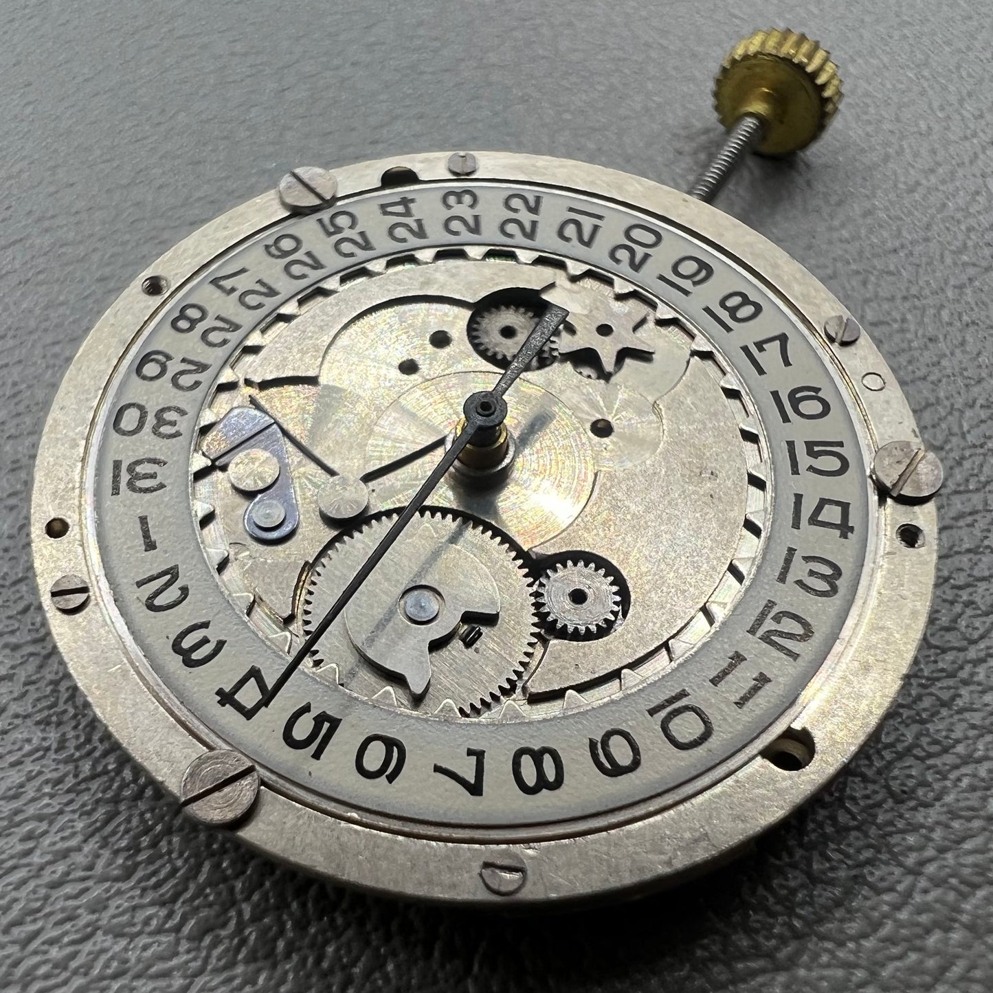 Swiss P-2460 quartz watch movement with 3 hands, precise timekeeping for watch repairs and accessories.