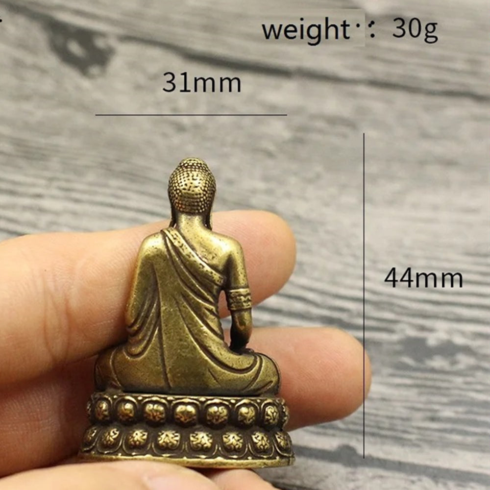 Hand-carved solid copper Buddha figurine with vintage bronze finish for elegant watch accessory display.