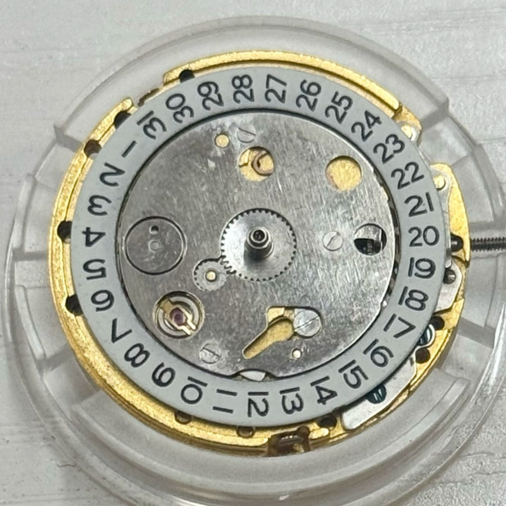 China Made 8205 2813 mechanical watch movement with single calendar and golden wheel detail.