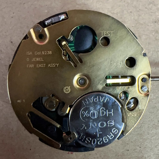 Swiss Made ISA 9238 quartz movement watch part with 6 multifunctional hands for precise timekeeping.