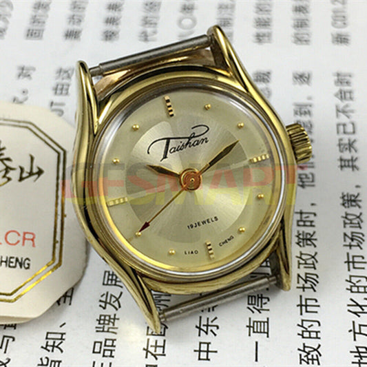 TAISHAN 27mm manual mechanical lady watch with 19 jewels and gold accents, elegant design for daily wear.
