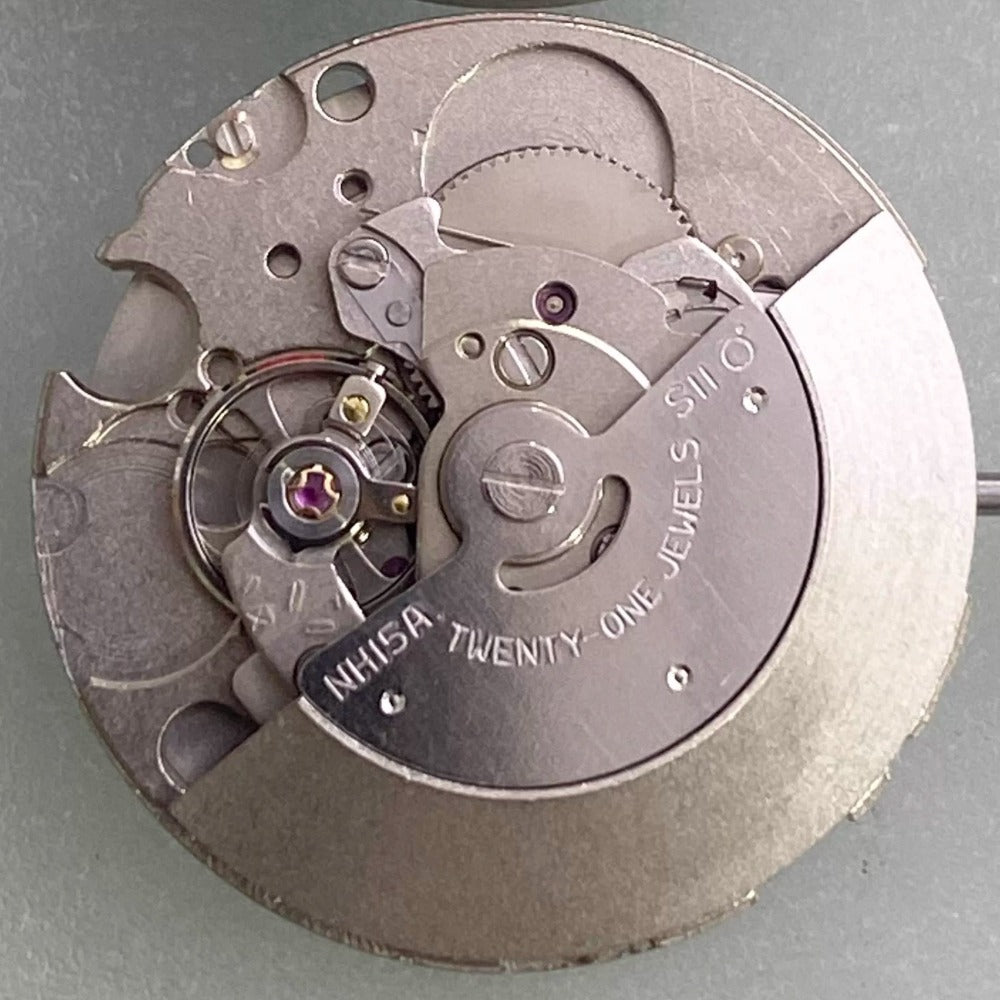 NH15 automatic watch movement by New Japan Made, showcasing precise single calendar function.