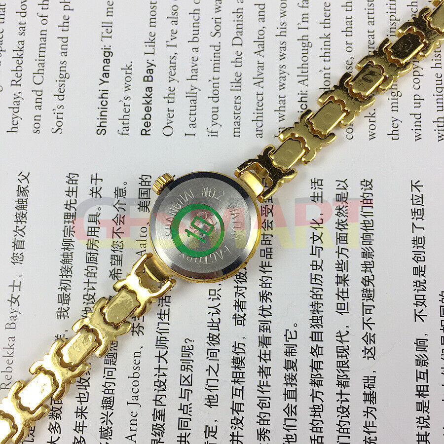 Baoshihua 22mm lady manual watch with 17 jewels and sparkling imitation diamond accents.