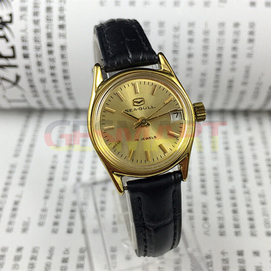 Round gold case Seagull ladies watch with nail hour markers, single calendar, and manual mechanical movement.