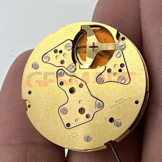 Ronda 5040B Swiss quartz watch movement with gold finish for precise timekeeping and durability.