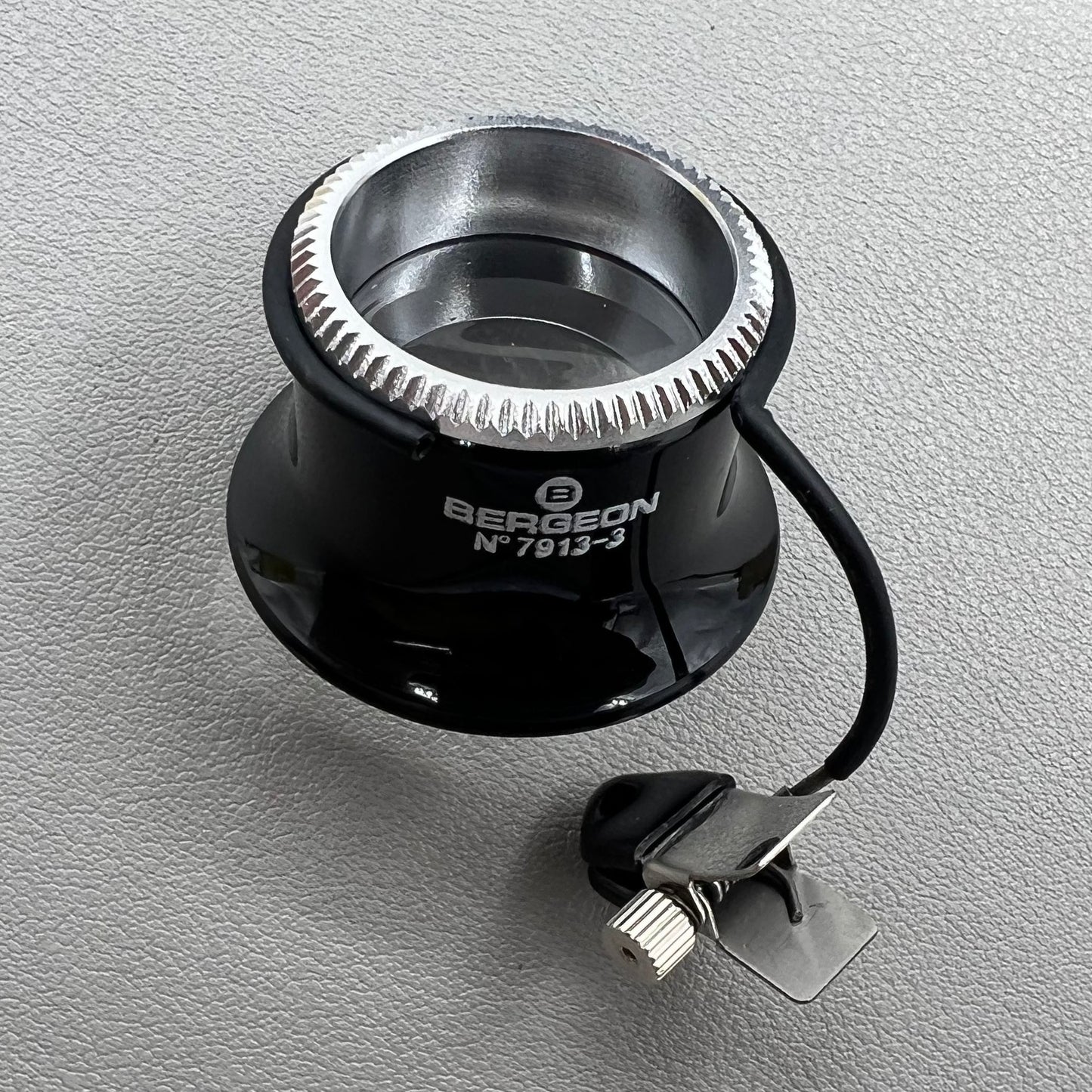 Swiss Bergeon 7913 3.3x magnifying eyeglass clip for precise watch accessory repairs and adjustments.