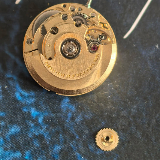 Swiss Made ETA 2671 automatic watch movement part for precise mechanical repairs and replacements.