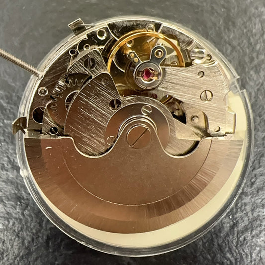 Chinese Liaocheng Silver watch accessory featuring automatic mechanical movement with small seconds at 6 and 9 o?clock position.