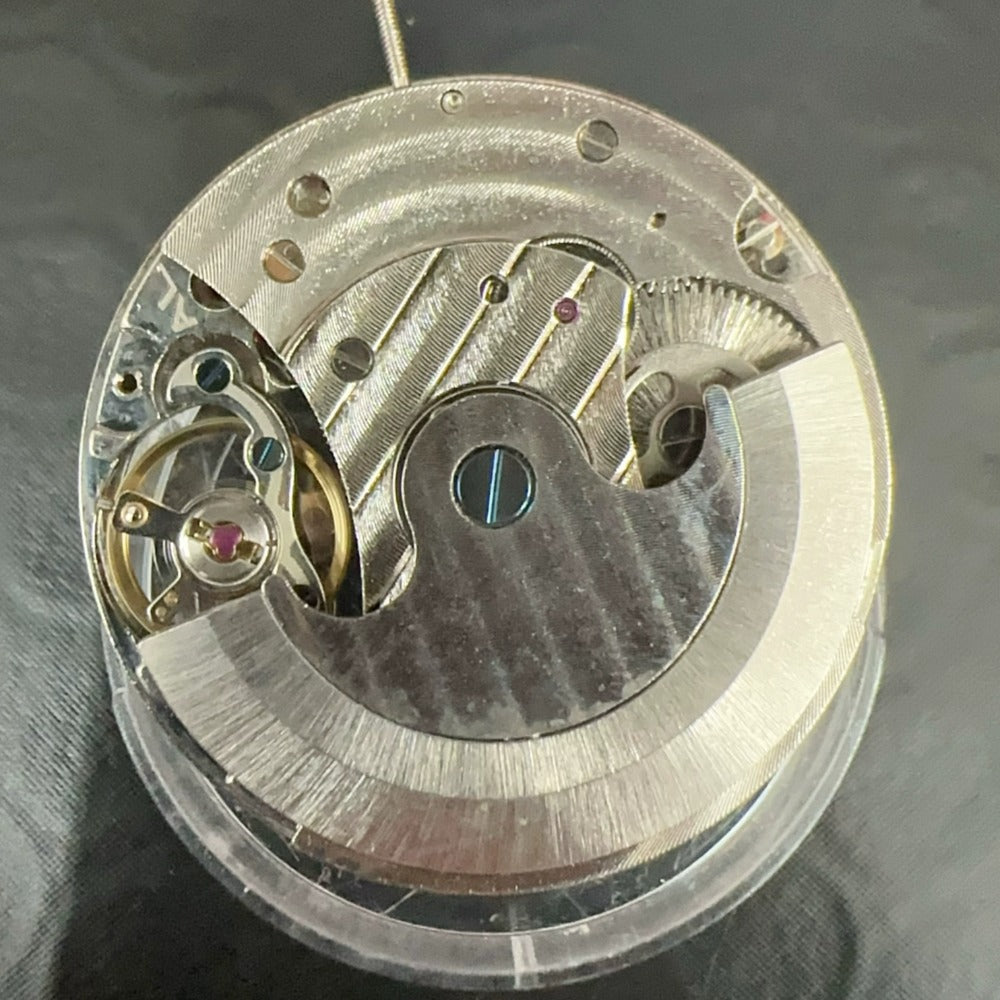 Hangzhou 2837 tourbillon watch showing automatic mechanical movement and small second hand by Hangzhou.