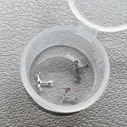 Set of 3 pallet forks for Shanghai 7120 movement, precise watch parts for smooth timekeeping.