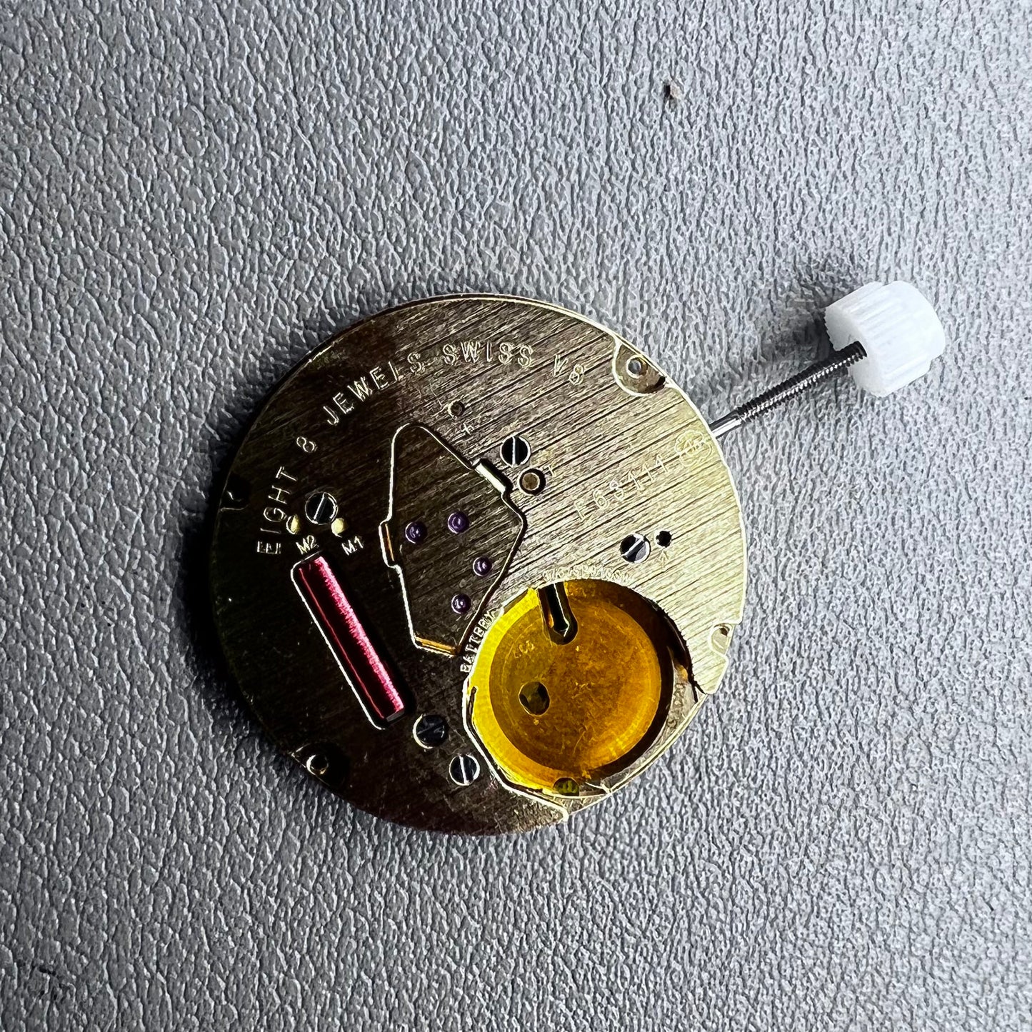 Swiss ETA E63.111 quartz watch movement with 3 hands and date display at 3 o?clock for precise timekeeping.
