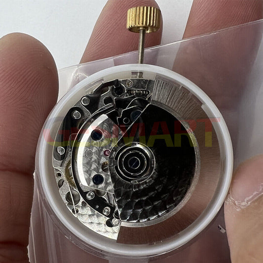 Close-up of Asian 7750 Chronograph Movement with white dial, single calendar, and second subdial @9, ETA style.