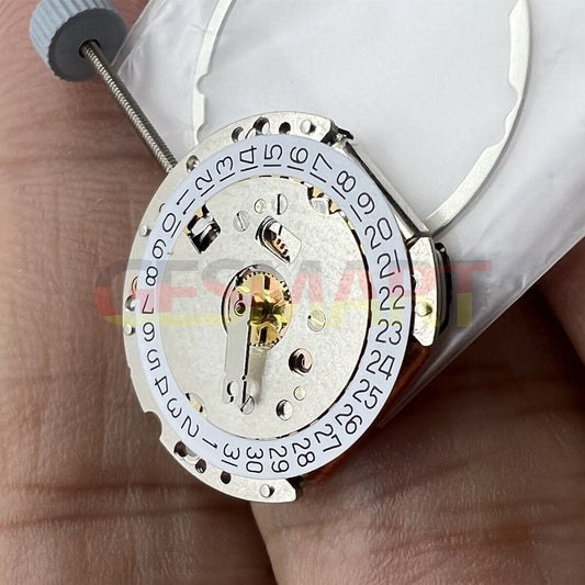 Ronda 775 Swiss quartz watch movement with date display at 3 o'clock, precision timing mechanism