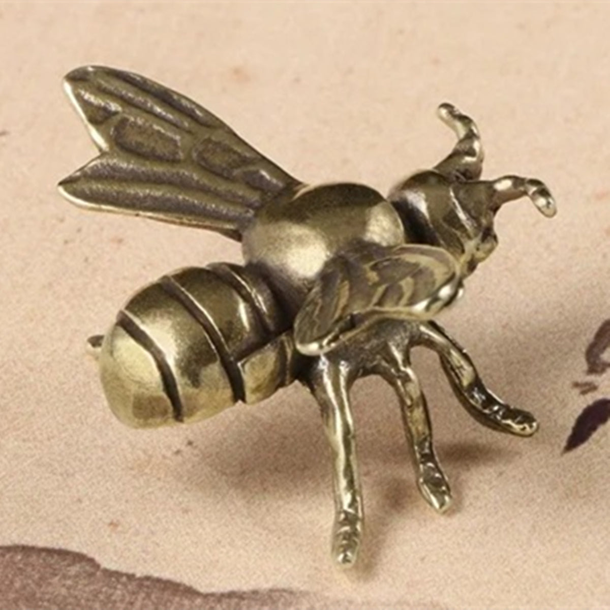 Solid copper bee trinket with vintage hand-carved bronze details, perfect for watch accessory display from.