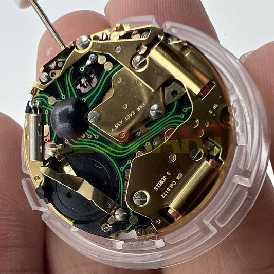 Watchmakers ISA 8172 golden quartz movement with date at 6 o'clock and watch stem for repair