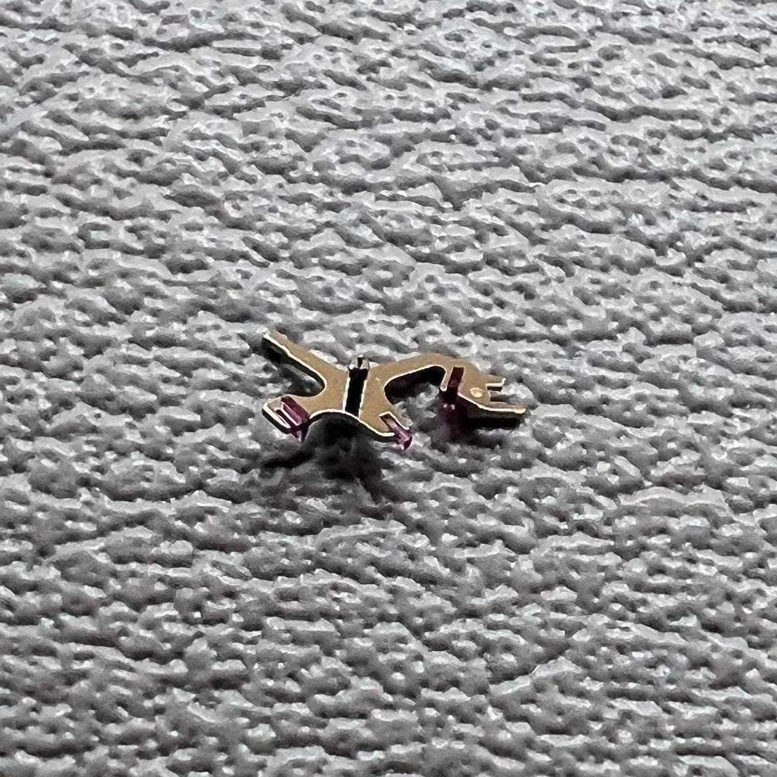 Pallet fork and escape wheel set for Omega 8500A movement, ensuring precise timekeeping and durability.