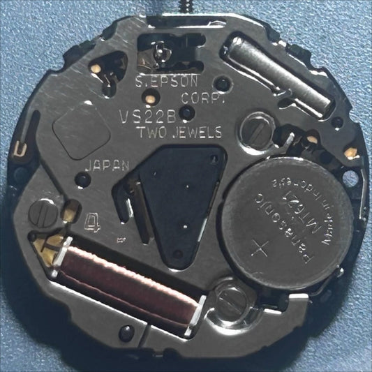 Epson VS22B solar watch movement with date at 3, Japan made, precise timekeeping mechanism.