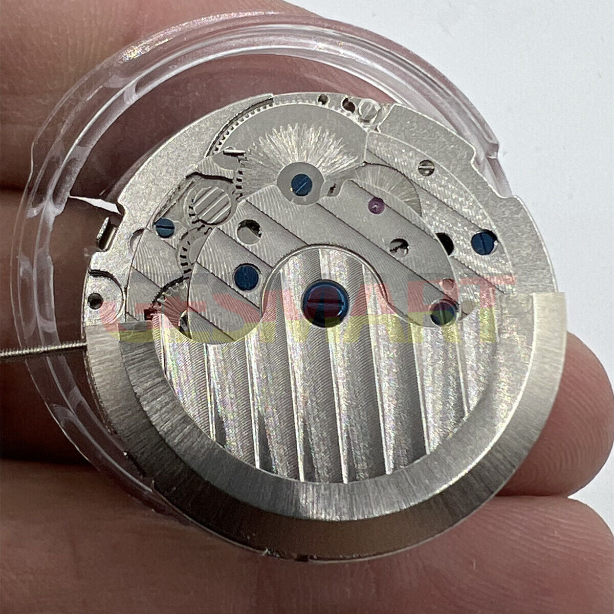 LB06 automatic watch featuring mechanical movement, 3 subdials, date at 3, day at 9 display.