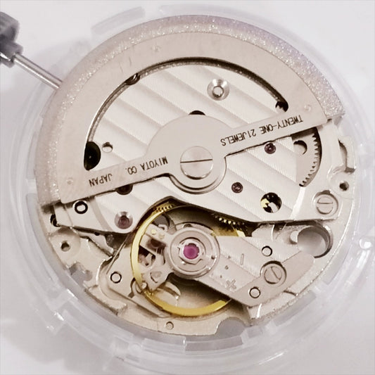 Japan Made Miyota 8217 mechanical watch movement with 3 hands, small second at 9, date at 3, precision engineered.