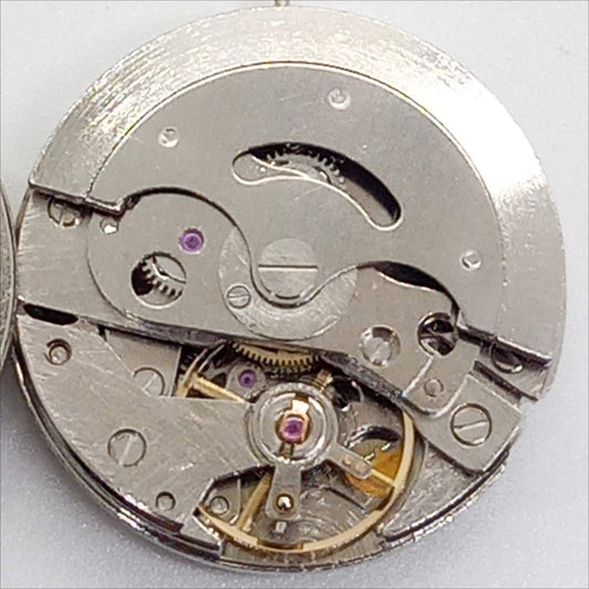 Dandong 7120 silver watch with mechanical movement, 3 hands, and date at 3 o?clock on classic dial