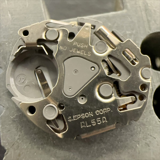 Epson AL55 quartz movement watch repair part with 3 hands, made in Japan for precise timekeeping.