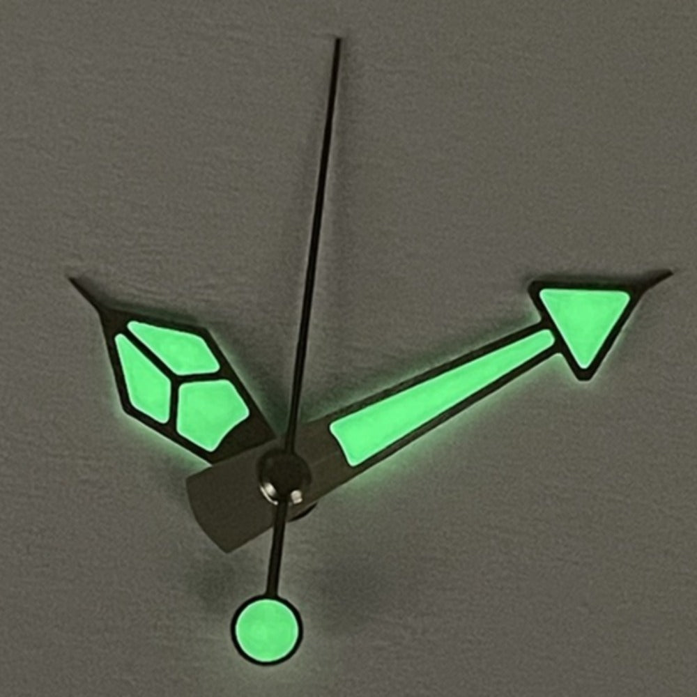 Orange and black trim watch hands with green lume for NH35/4R36/6R15/7S26 movements, enhancing visibility.