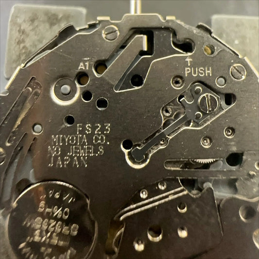 Miyota FS23 quartz watch movement with date window at 3, Japan-made precision by Miyota.