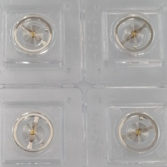 Set of 3 silver balance wheels for 7009 movement, precision components made in China for watch repair.