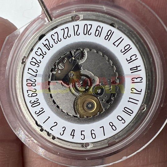 ETA 955.414 Swiss quartz watch movement with date display at 6 o'clock, for precise timekeeping.