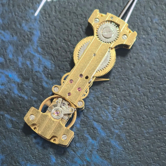 Golden long hand winding mechanical movement watch part, precision craftsmanship, China Made accessory.