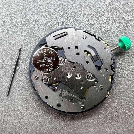 Japan Miyota OS10 quartz watch movement showing date display at 3 o'clock position.