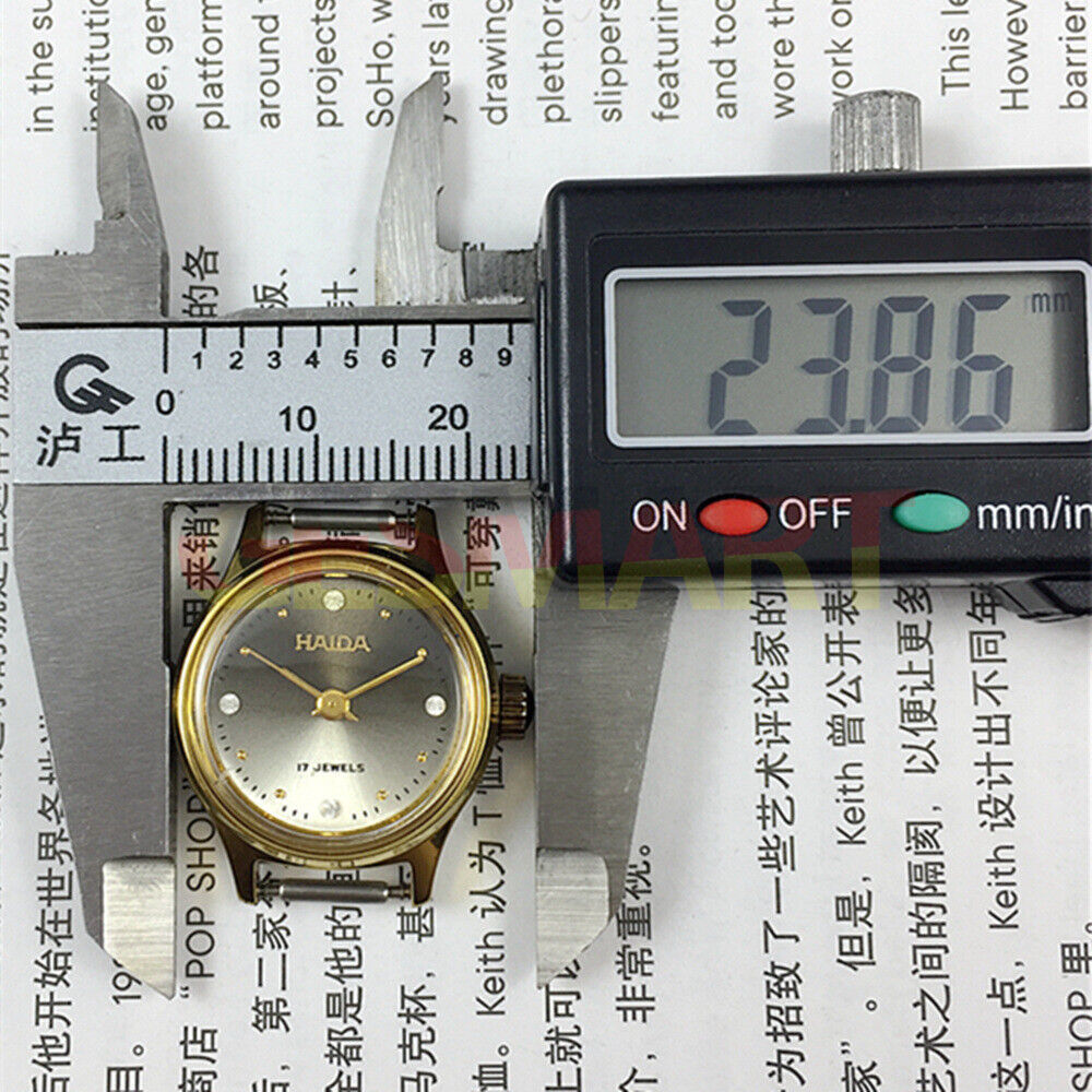 SHANGHAI HAIDA Montre mécanique manuelle pour femme, boîtier doré, imitation diamant, clou
