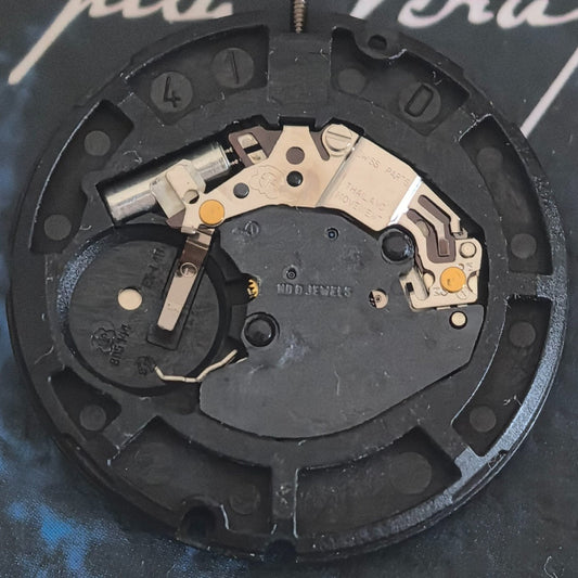 Swiss ETA805.144 quartz movement with silver dial, 3-hand watch part for precise repair and replacement.