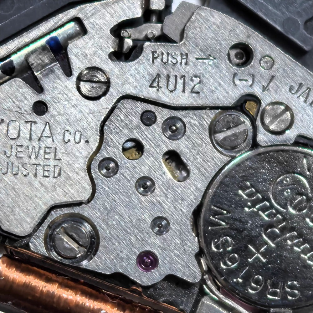 Miyota 4U12 quartz watch movement with single calendar date at 6, Japan-made precision for watch repairs.