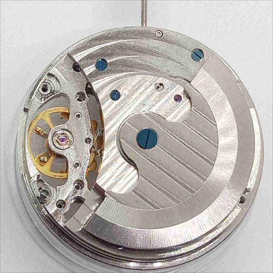 Silver hollow mechanical watch with moonphase at 3 o'clock and large flywheel, China made.