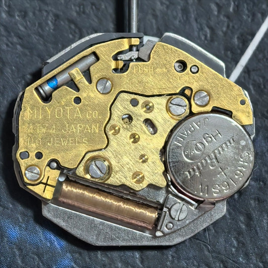 Japan Made Miyota 4T74 quartz watch movement with 2 hands and date display at 3 o'clock.