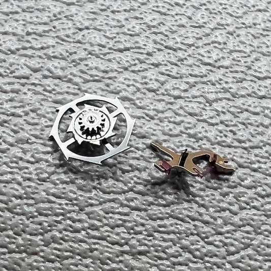 Pallet fork and escape wheel set for Omega 8500A movement, ensuring precise timekeeping and durability.