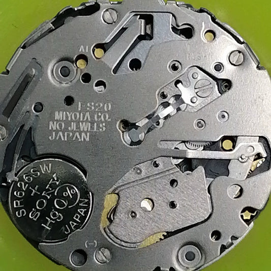 Japan-made FS20 quartz movement watch part with date at 12, multifunctional black dial for precise timekeeping.