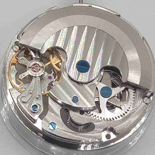 Veined hollow silver watch with mechanical movement and small second at 6, China-made craftsmanship.