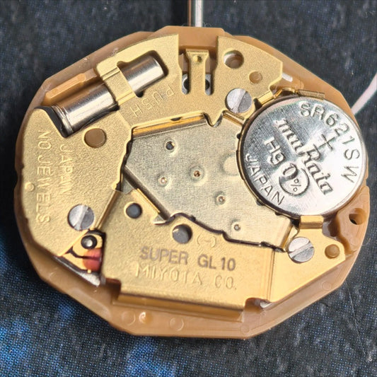 Miyota GL10 quartz watch movement with date at 3, three hands, Japan made precision.