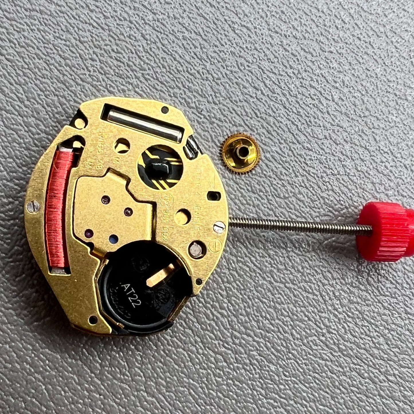 Swiss ETA 902.002 quartz watch movement with two hands, precision engineering by ETA.