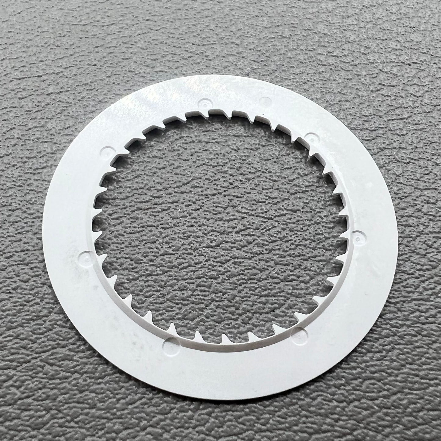 Blue date disk wheel for NH35 watch movement on white background, precise accessory.