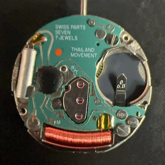 Swiss Made ETA 956.114 black dial watch movement with 2 hands and golden date font at 6 o'clock