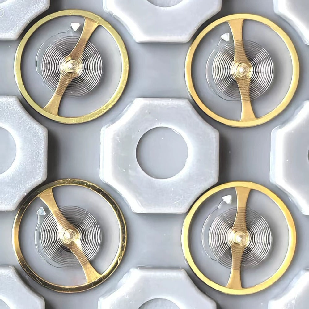 Original Japan-made balance wheel for Miyota 9015 movement, precise watch repair component.